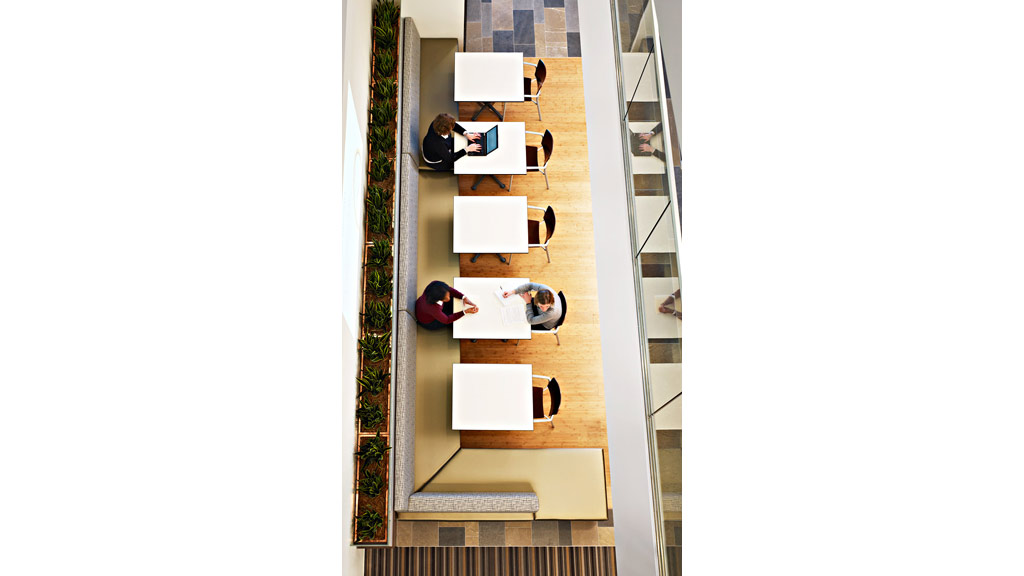 A group of people sitting at a table.