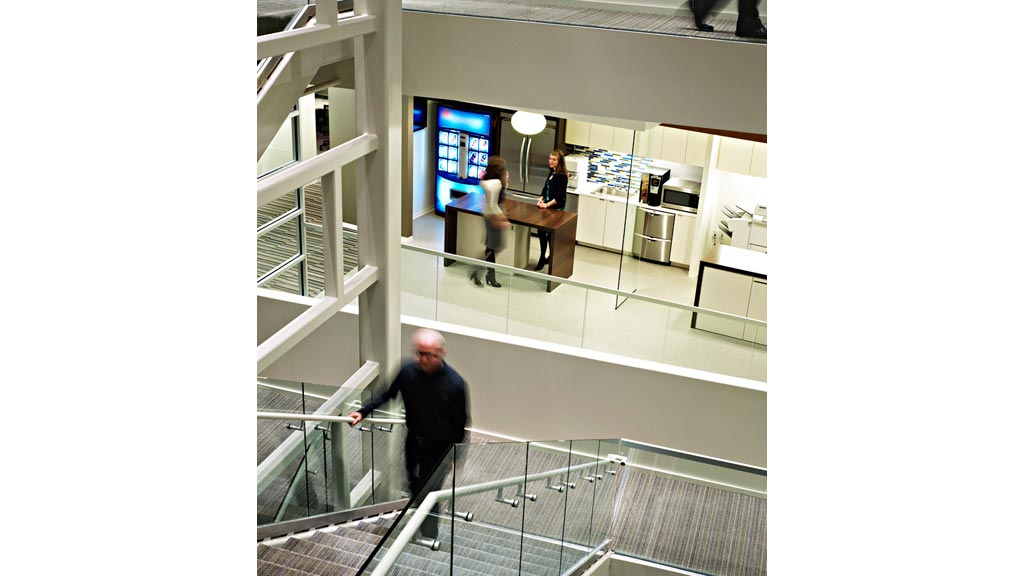 A person walking down a flight of stairs.