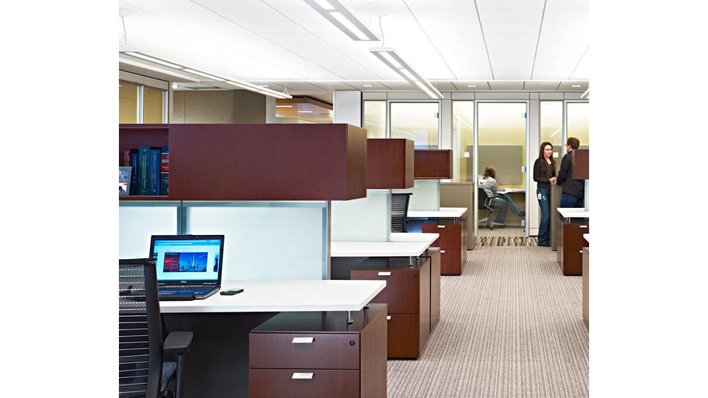 A few people in an office.