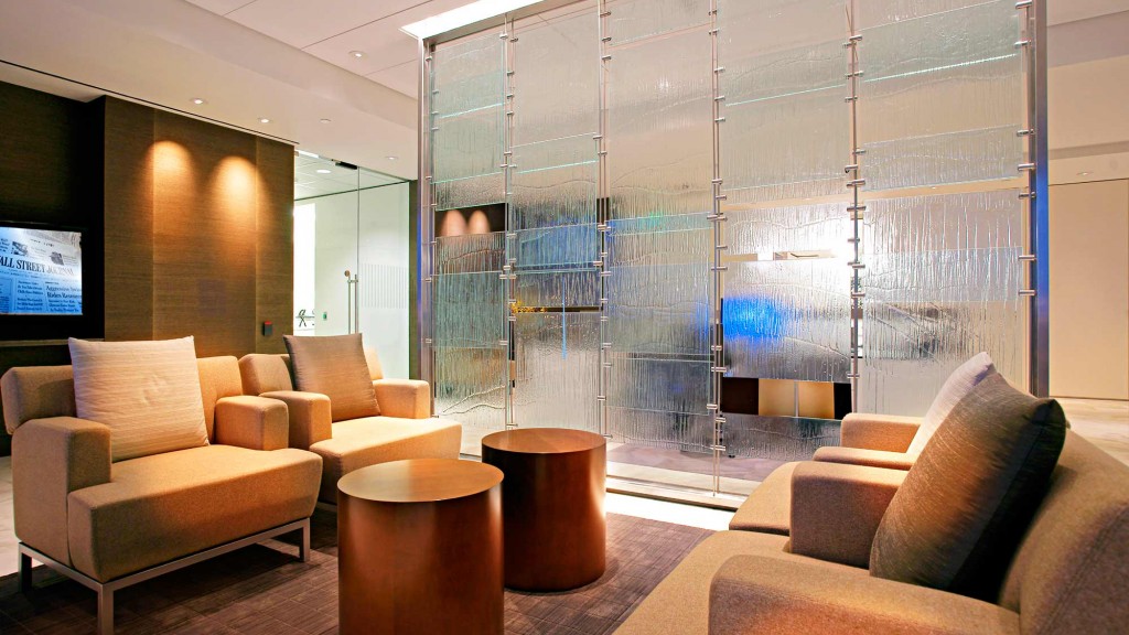 A room with a large glass wall.