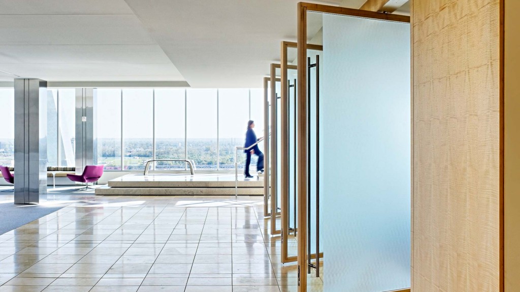 A person walking in a hallway.