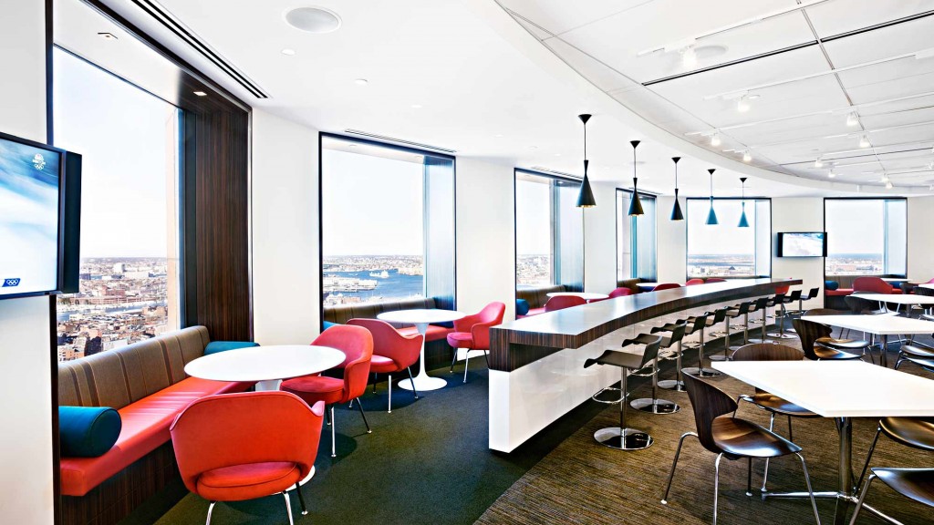A room with tables and chairs.