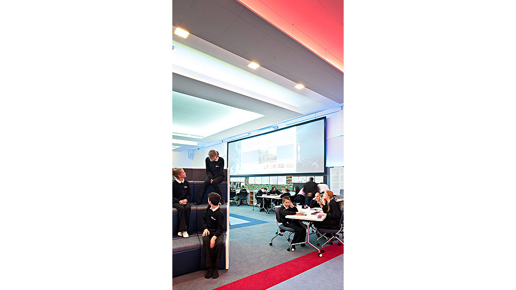 A group of people in a meeting.