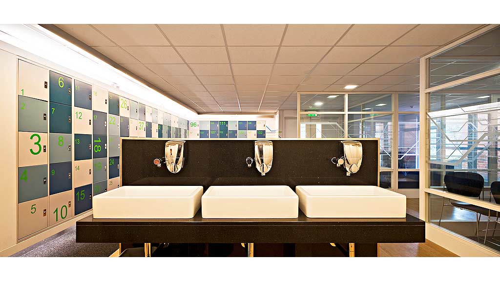 A group of sinks in a room.