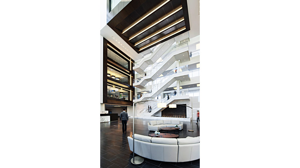 A person walking down a hall.