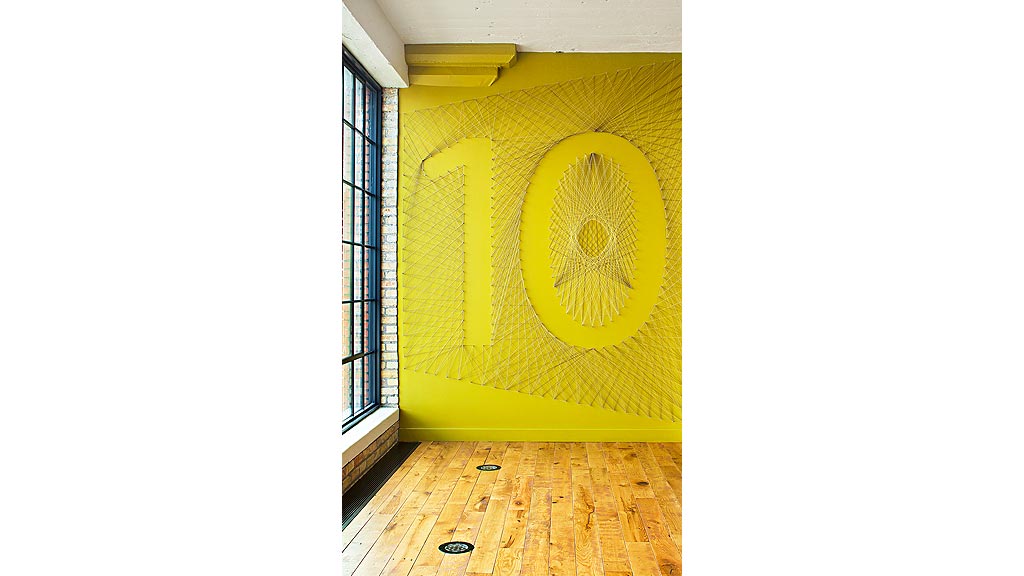 A room with a yellow wall.