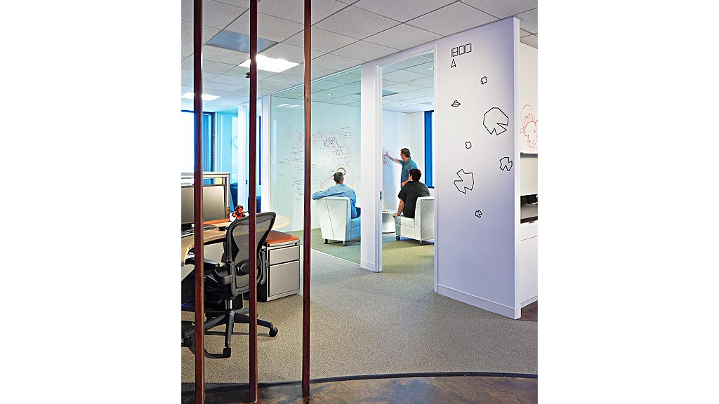 A few people in an office.