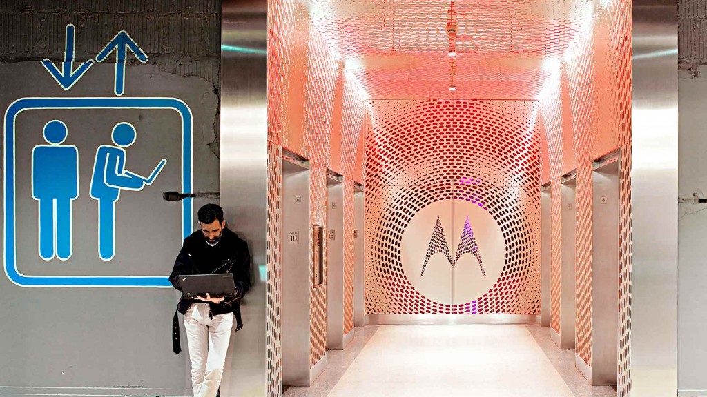 A person standing in a hallway.