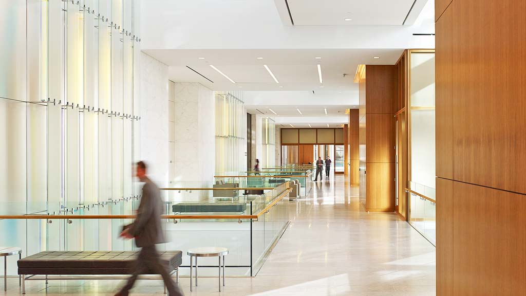 A person walking in a large room.