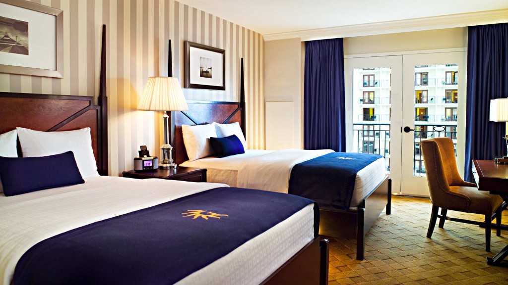 A hotel room with two beds.