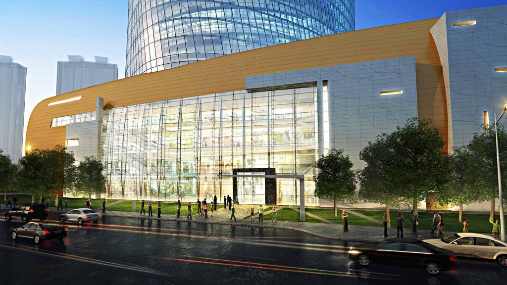 A large glass building with many windows.