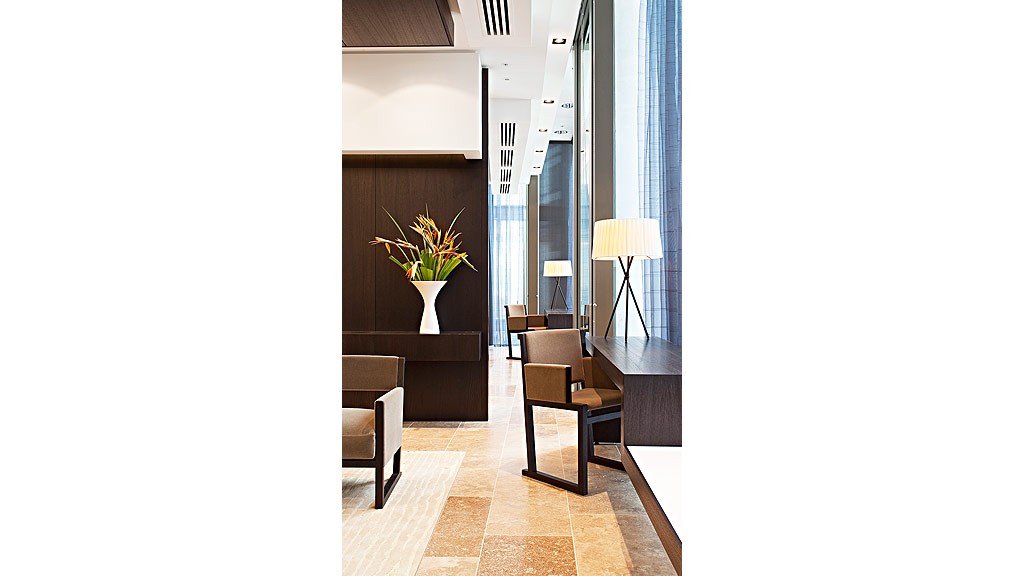 A room with chairs and a table.