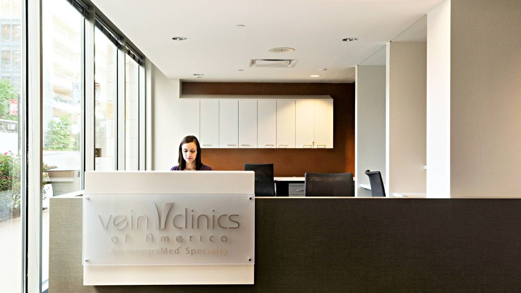 A person sitting at a podium.