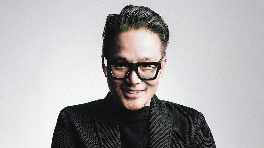 A man wearing glasses.