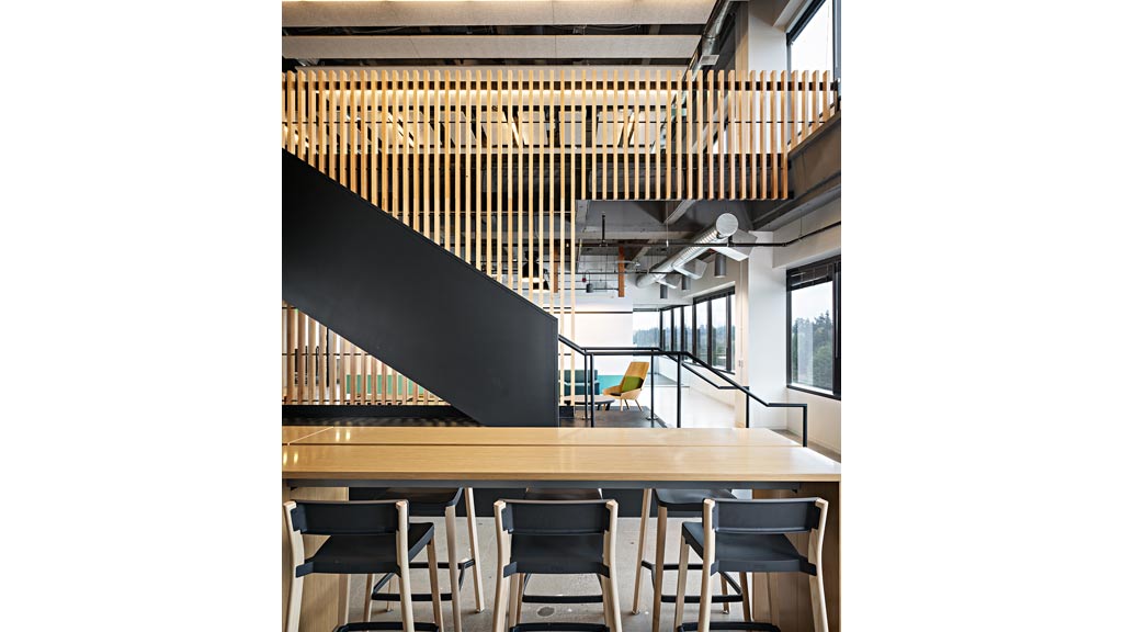 A room with a table and chairs.