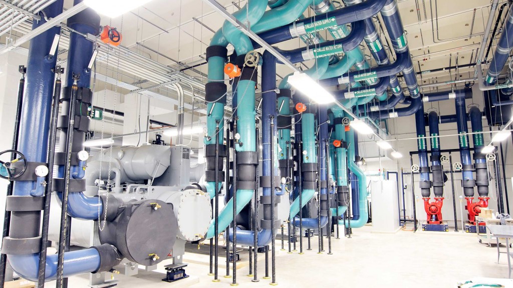 A large room with pipes and machinery.