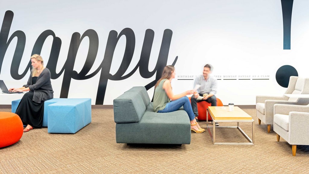 A group of people sitting in chairs.