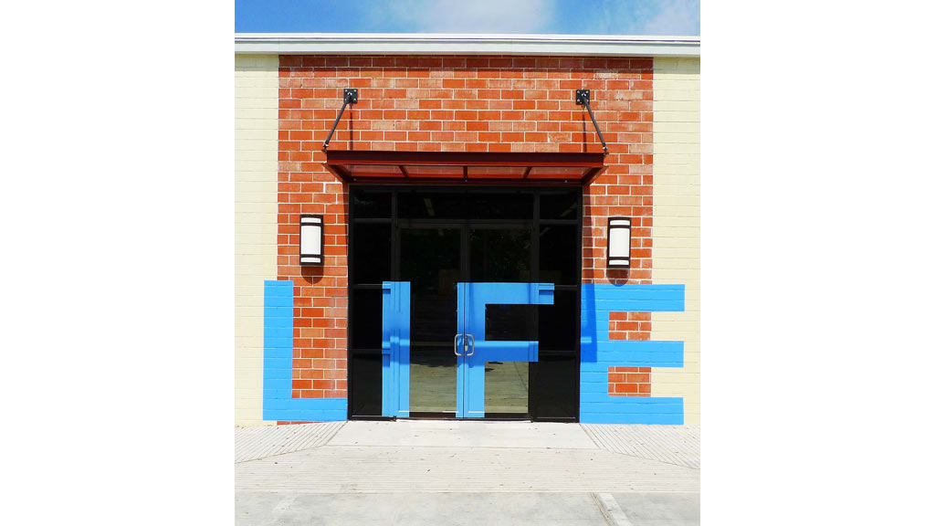 A building with blue doors.