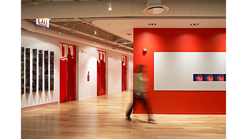 A person walking in a room.