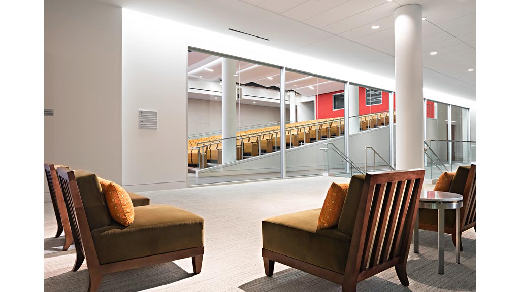 A room with chairs and a table.