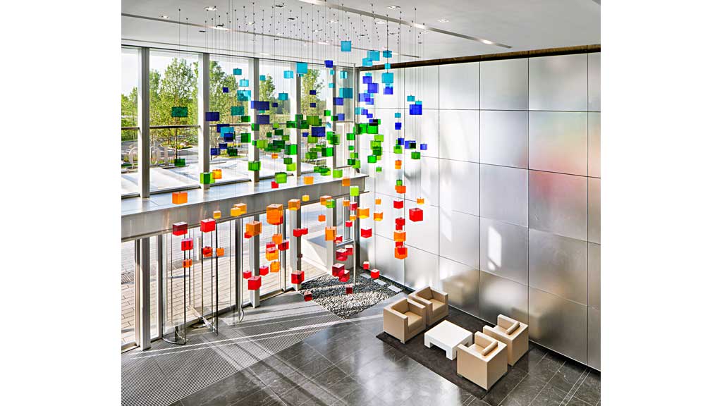 A large white wall with many boxes and boxes on it.
