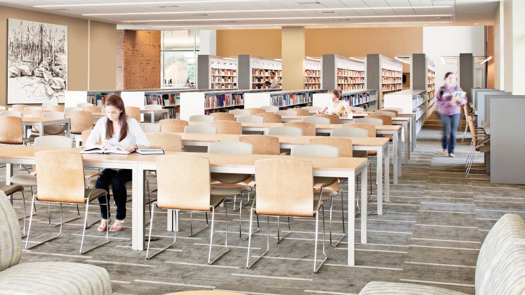 A group of people in a library.