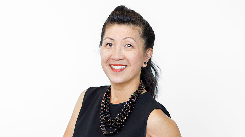 A person smiling for the camera.