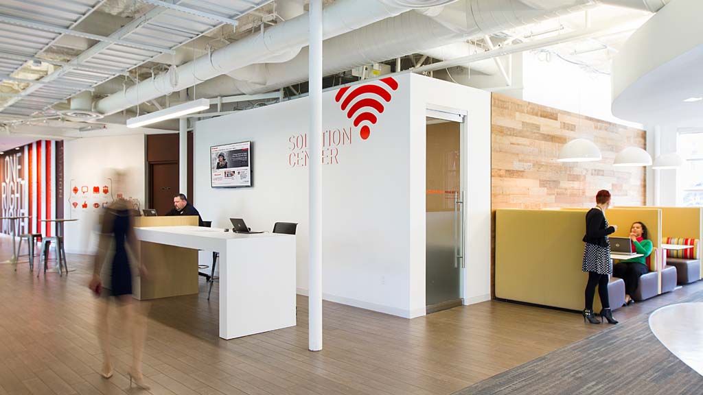 A group of people in a room.