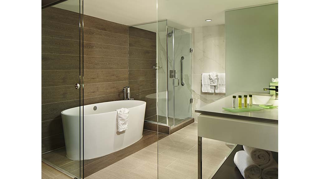 A bathroom with a glass shower.