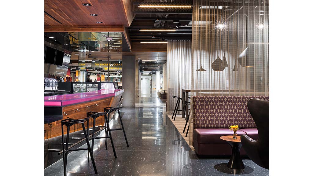 A bar with a bar and chairs.