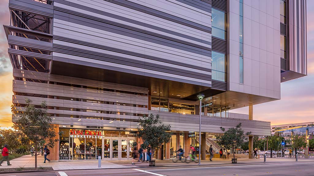 A street with people and buildings.
