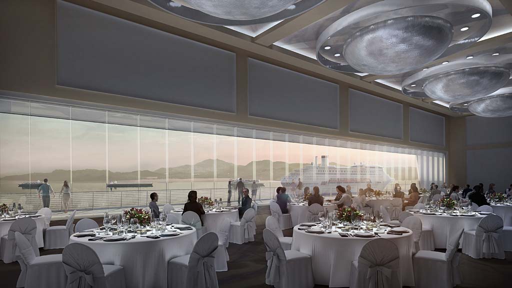 A group of people sitting at tables.