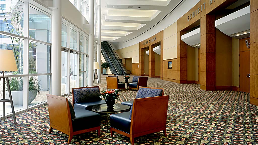 A living room with a staircase.