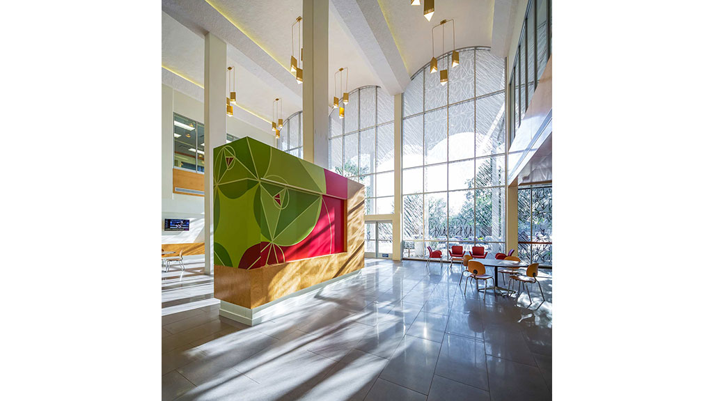 A colorful umbrella in a room.