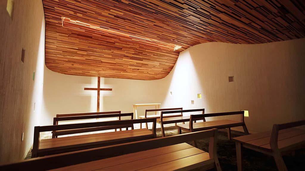 A room with benches and a lamp.