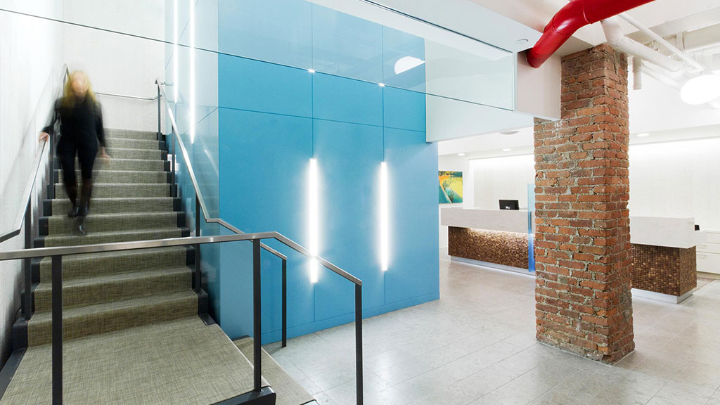 A person walking up a flight of stairs.