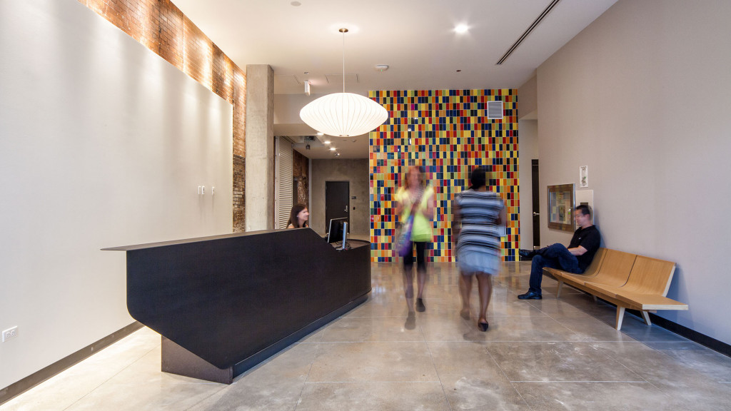 A group of people in a room.