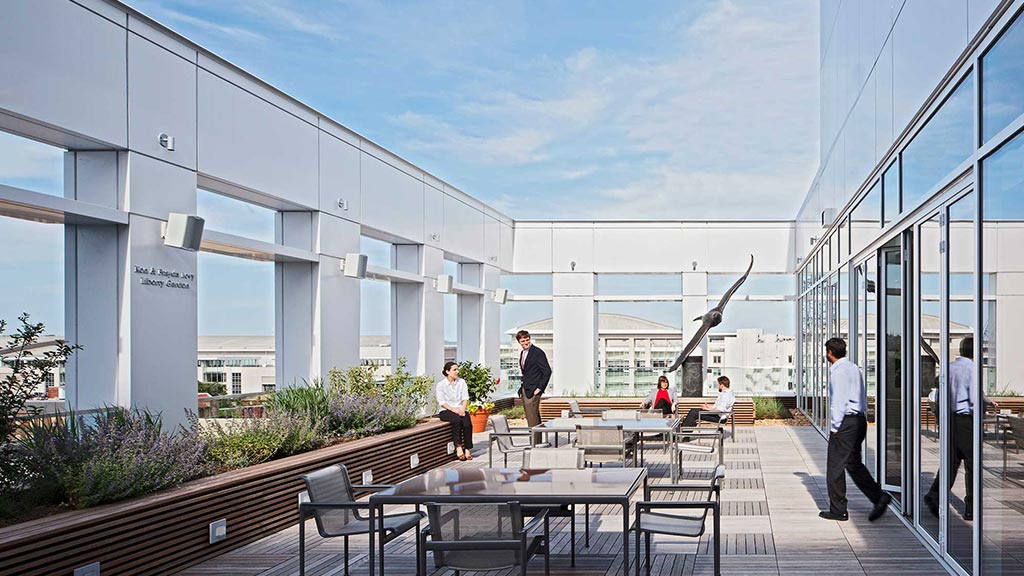 A group of people outside a building.