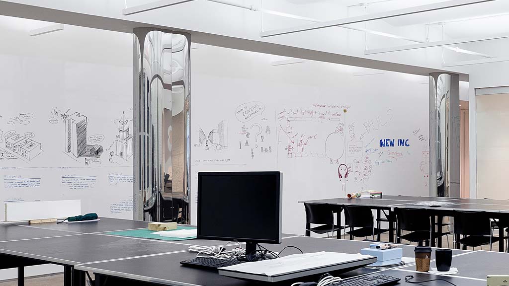 A white board with writing on it.