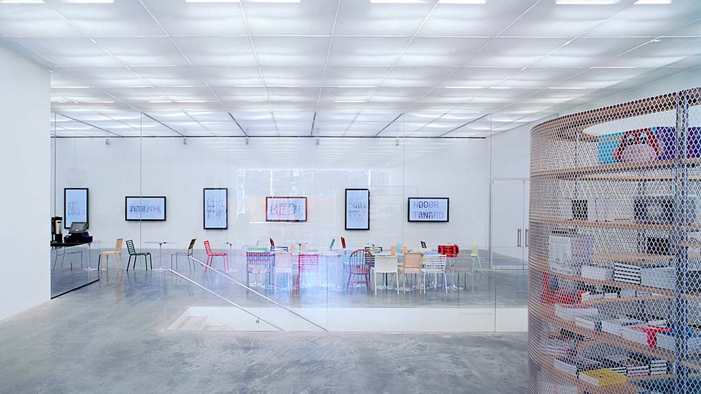 A room with tables and chairs.