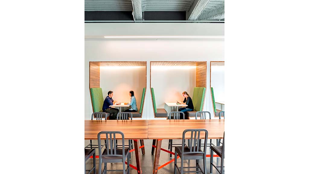 A few people sitting at a table.