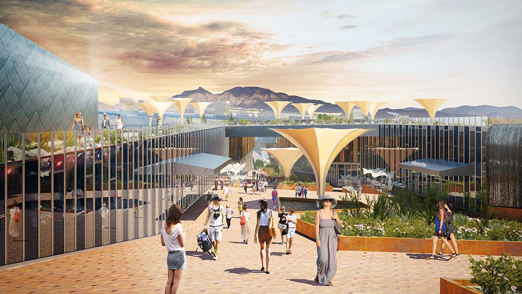 People walking around a large building.