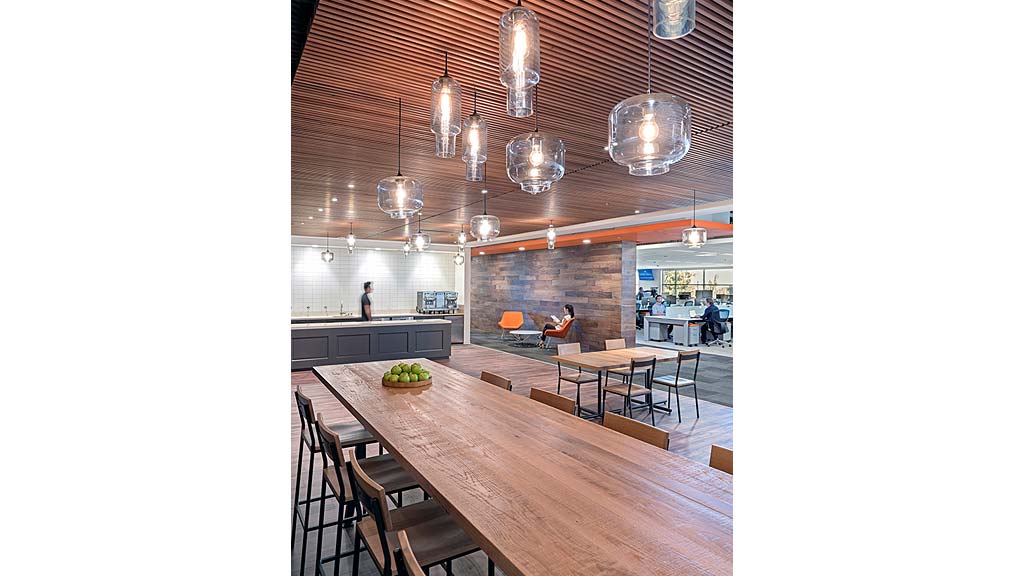 A large room with tables and chairs.