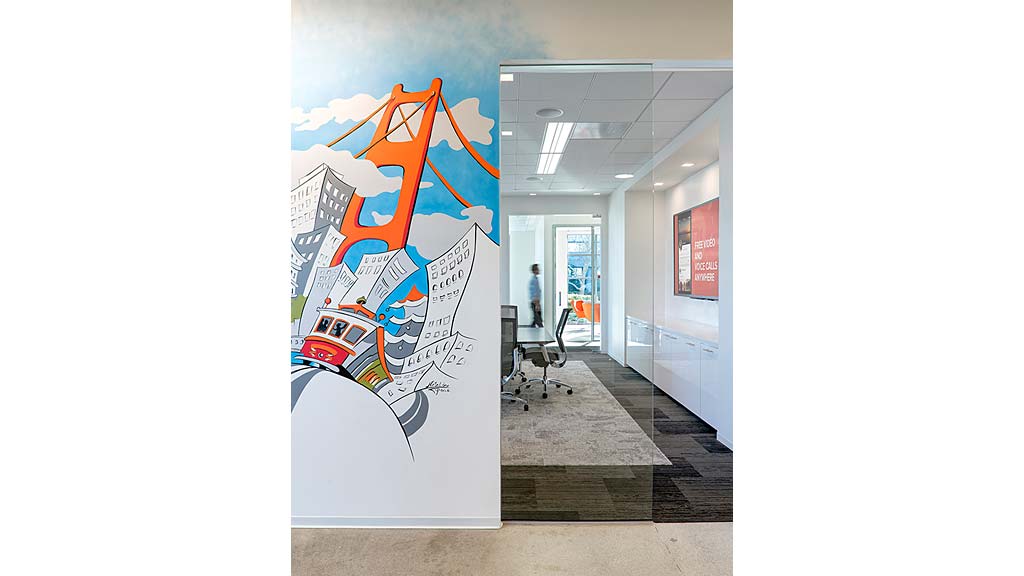 A person standing in a hallway.