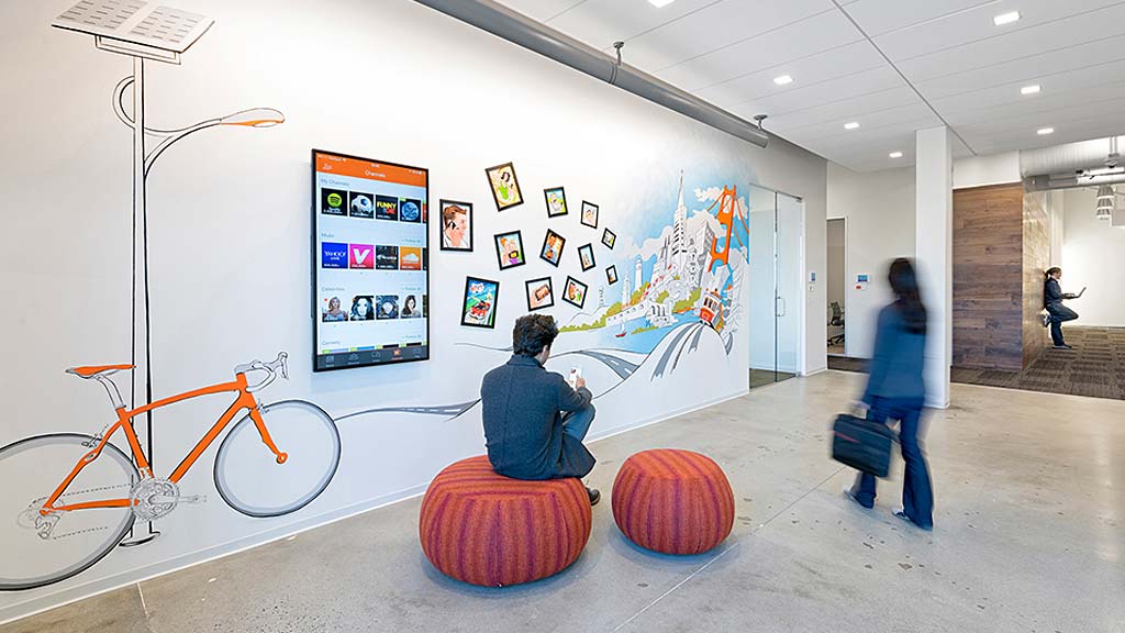 A man and a woman in a museum.