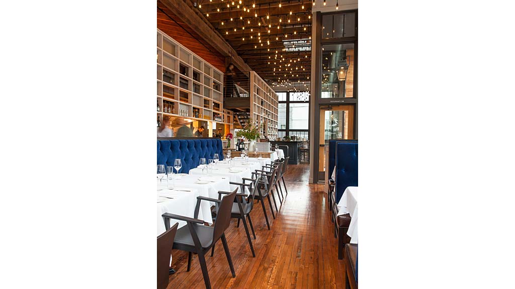 A room with tables and chairs.