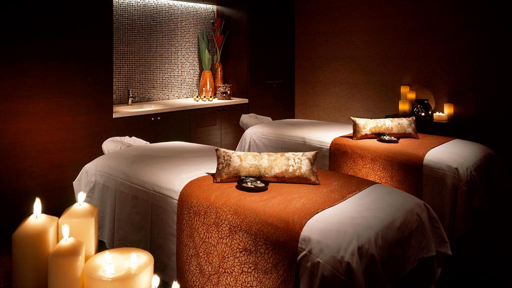 A hotel room with two beds.