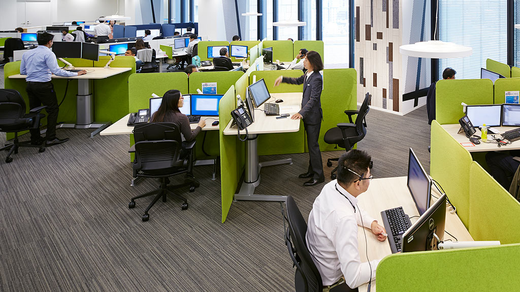 A group of people in an office.