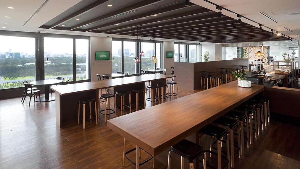 A large room with tables and chairs.