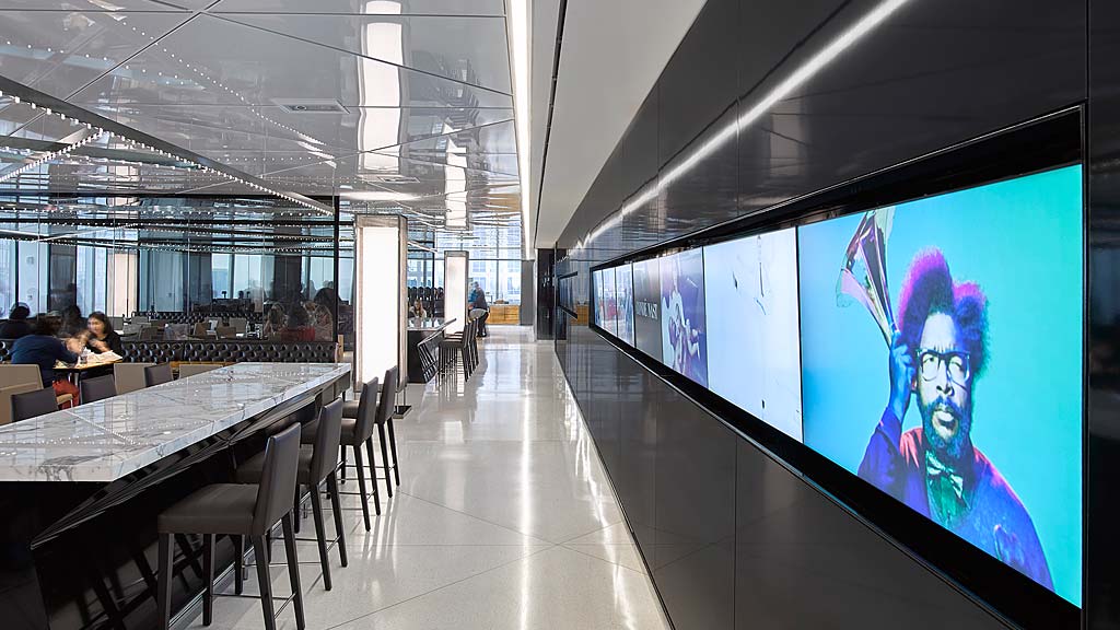 A room with tables and chairs.